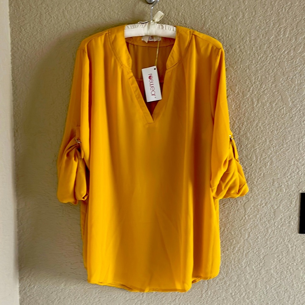 Three quarter length sleeve blouse, new with tags